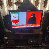 تلویزیون ۴۳ اینچ همراه میز قیمت ۲۳میلیون