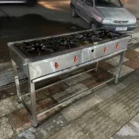 اجاق 4 شعله صنعتی خطی پایه دار مشابه نو|فروشگاه و مغازه|تهران, شهرک استقلال|دیوار