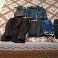 تعدادی لباس بچه نو