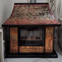 بخاری گازی شومینه‌ای در حد نو