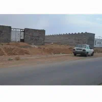 زمین-باغی-حاجی-اباد-بر-آسفالت