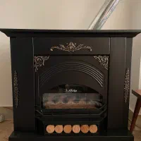 بخاری گازی طرح شومینه در حد نو