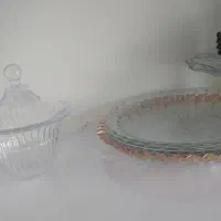 فروش ظروف شیشه ای و لباس تو خونه‌ای و کاپشن