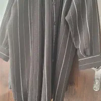 مانتو مشکی در حد|لباس|قم, قلعه کامکار|دیوار