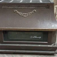 بخاری و کپسول گاز