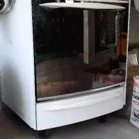 گاز فر دار تکنوگاز و میز تلویزیون و سینک