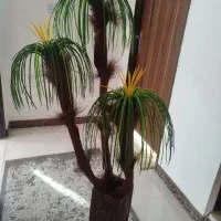 گل مصنوعی با گلدان سفالی نقش برجسته