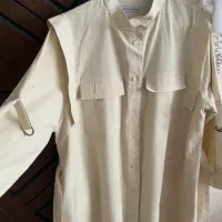 مانتو بلند شیری رنگ|لباس|بوئین زهرا, |دیوار