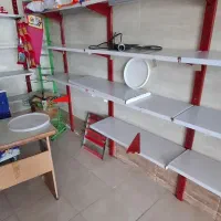 فروش قفسه ها. دوتا یخچال . دو تا فریزر .