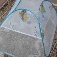 پشه بند کلبه ای و گهواره کودک