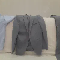 کت وشلوار بچه گانه همراه لباس وکفش سایز۶ درحد نو