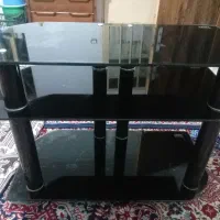 یک عدد میز تلویزیون شیشه ای سالم