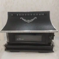 بخاری شومینه پولار خوشگل در حد نو‌نو با لوله