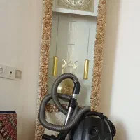 ساعت وجاروبرقی