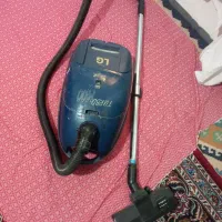 یک عدد جاروبرقی کار کرده