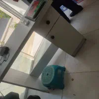 یک عدد میز. و تعدادی رگال کفش|فروشگاه و مغازه|بندر گناوه, |دیوار