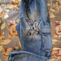 شلوار جین اسلش پاچه کشدار