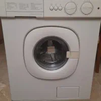 یه عدد فریزر و ماشین لباسشویی تمیز و سالم