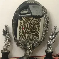 ( ایینه و شمعدان نقره )طرحه ادم و حوا