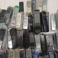 تعدادی کنترل تلویزیون ته انباری