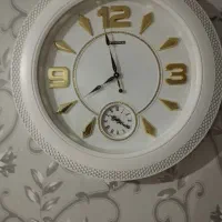 ساعت دیواری وتابلو فرش