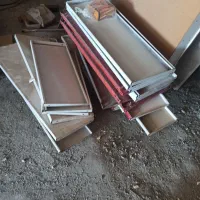 فروش تعدادی درب و پنجره آهنی و کابینت آشپزخانه ه