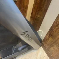 تردمیل و تعدادی وسایل ورزشی