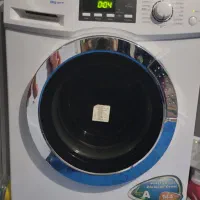 ماشین لباسشویی جنرال و ساعت دوتیکه