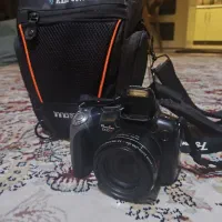 دوربین عکاسیpawershot sx10is همراه با پایه