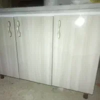 یک عدد کابینت سه درب واجاق گازاستیل سینجر