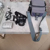 دوربین عکاسی و فیلم برداری کانن مدل sx20 سوپر زوم