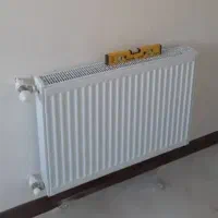 تاسیسات ولوله کشی پنج لایه وسفید،نصب رادیاتور،