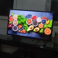 تلوزیون 32 اینچ ال ای دی با میز