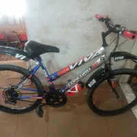 دوچرخه دنده ای ۲۶ درحد نو لاستیکها وسایلها نو