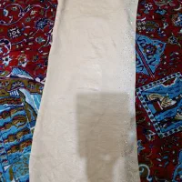 تعدادی لباس مانتو شلوار پیراهن شال و روسری