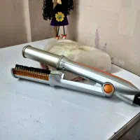 اتو مو برس دار چرخشی