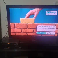 تلوزیون اسنوا ۳۲ اینچ با دیجیتال و میز تلوزیون