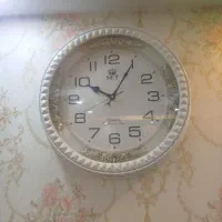 ساعت دیواری وتابلو
