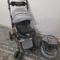 کالسکه و نی نی لای بچه