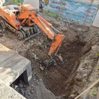 خاکبرداری وتخریب ساختمان