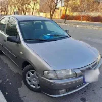 سواری مزدا ژاپن 323 F، مدل ۱۳۷۸ با برگه کارشناسی