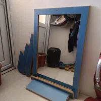 آینه بزرگ و آویز لباس