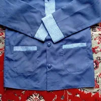 یک دست لباس فرم کلاس اول پسرانه مدرسه حاج تقی