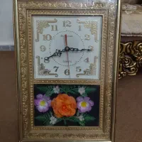 ساعت دیواری طلایی