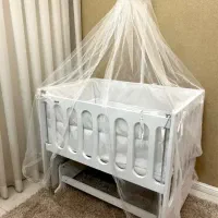 گهواره کنار مادر