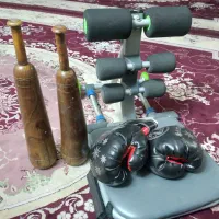 ۱عددتن تاک.یک جفت دستکش‌ ورزشی یک جفت میل باستانی