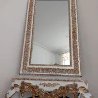 اینه و کنسول و ساعت