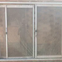 پنجره آلومینیومی سه کشو با فرم اهنی