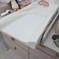 تعویض پوشاک کودک