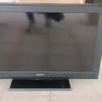 تلویزیون به همراه میز